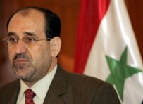 Prime Minister al-Maliki speaking to reporters in Baghdad on June 14 (epa)
