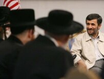 Iranian President Mahmud Ahmadinejad (right) chatting with Jewish delegates to the Holocaust conference in Tehran (Fars)