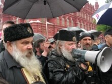 Anti-gay protesters at the parade in May