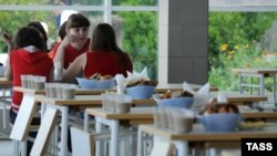 Children eat at the Orlyonok children's camp, where more than 100 children required hospitalization, in Krasnodar in June.