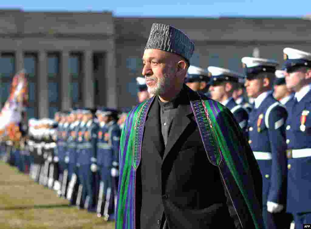 Afghan President Hamid Karzai reviews an honor guard at the Pentagon before his meeting with U.S. Secretary of Defense Leon Panetta in Washington. (AFP/Jewel Samad)