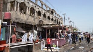 The aftermath of a bomb attack in the southern Iraqi city of Basra on May 20. 