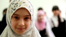 A girl wearing hijab at a school in the republic of Daghestan.