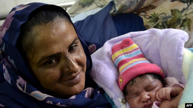 Pakistani gang-rape survivor and activist Mukhtar Mai and her son, pictured here in November 2011, will attend the meeting.