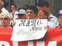 The arrival of Western ships in the Ukrainian port of Simferopol earlier in the summer prompted anti-American and anti-NATO protests (RFE/RL)