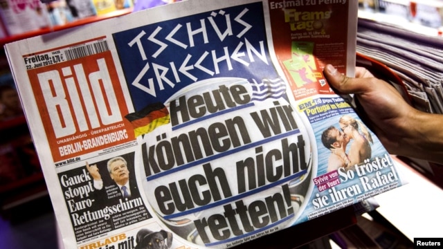 The German tabloid "Bild's" headline says: "Bye-bye, Greece. Today we won't be able to save you!" 