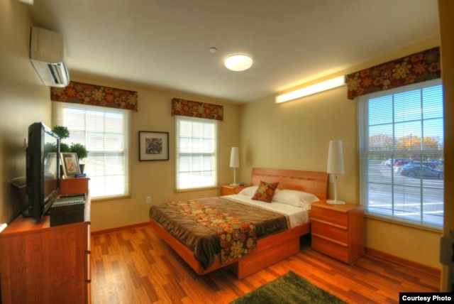 A promotional photo from SeaBox shows an apartment made from shipping containers.