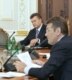 President Viktor Yushchenko (foreground) with Viktor Yanukovych at talks on forming a government on July 27, 2006