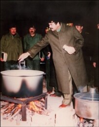 Saddam Hussein cooks soup for his troops in Kuwait on January 1, 1991 (AFP)