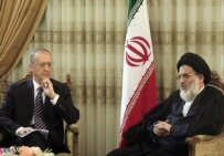 Judiciary head Hashemi-Shahrudi (right) told the UNODC's Costas Iran is a \