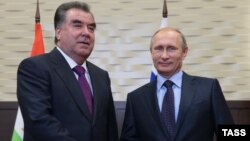 Tajik President Emomali Rahmon (left) made his remarks during a meeting with Russian President Vladimir Putin in Sochi on October 6.
