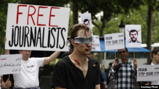 France/Iran – Reporters without Borders protests in front of the Iran Air offices to denounce the imprisonment of journalists in Iran and to commemorate the 10th anniversary of the death in jail of the Iranian photojournalist Zahra Kazemi, Paris, 10Jul2012 