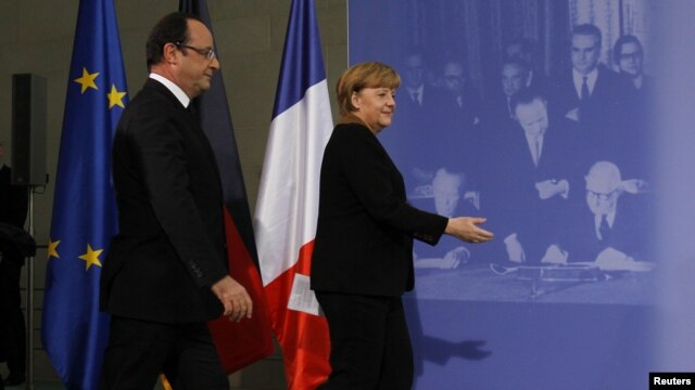 Angela Merkel şi Francois Hollande la ceremoniiile de la Berlin