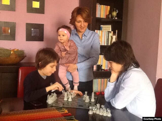 Marijana Kadic-Bojanic with her two sons, Niksa and David, and her 7-month daughter, Iskra.