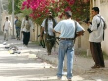 Iraq -- Members of the Imam Al-Mahdi Army militia in a residential area in Al-Basrah, 26Mar2008