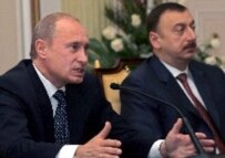 President Putin (left) with President Aliyev on 22 February (epa)