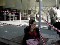 Parliamentary candidate Shukria Barekzai at a Kabul voting station during the country's legislative elections in September 2005 (RFE/RL)