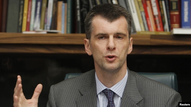 Russian billionaire Mikhail Prokhorov gestures during a news conference in Moscow on September14.