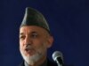 Karzai's Political Juggling Act Heads To Washington