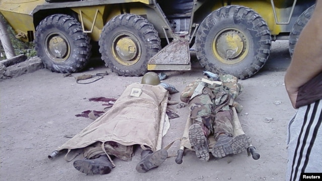 Bodies of government soldiers reportedly killed during recent fighting in the town of Khorog