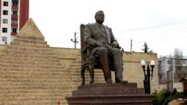 Monument of Egypt president Hosni Mubarak in a Baku park