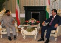 Ahmadinejad (left) with Rakhmonov in Dushanbe on July 25 (RFE/RL)
