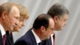 Russia's Vladimir Putin, Germany's Angela Merkel, France's Francois Hollande, and Ukraine's Petro Poroshenko at peace talks in Minsk on February 11.