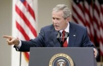 President Bush answering questions outside the White House today (epa)