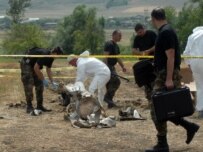 Investigators at site of object's landing in Georgia on August 7 (InterPressNews)