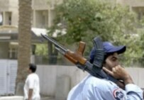 An Iraqi policeman guards the Egyptian embassy in Baghdad