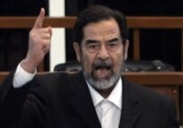 Hussein shouts in court after receiving the verdict (AFP)