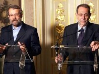 Larijani (left) and Solana met in Portugal on June 23 (epa)