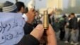 Egypt -- A protester shows a spent bullet casing during a demonstration onTahrir Square in Cairo, 19Dec2011