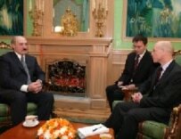 Lukashenka (left) speaking to Reuters in Minsk (official site)