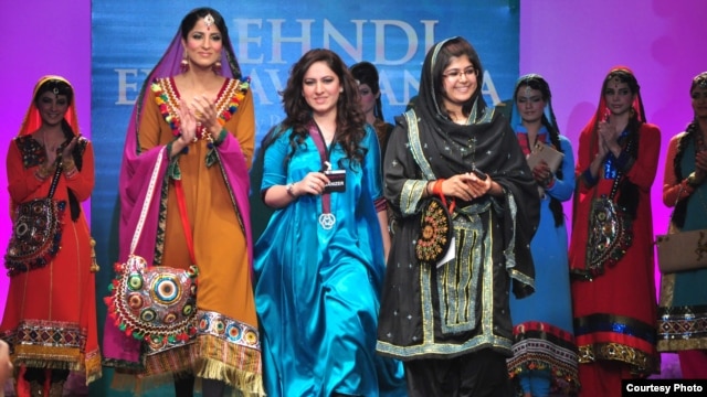 Fashion designer Parkha Khan, 22, (center) runs the Karachi-based fashion house Dew Drops Couture.