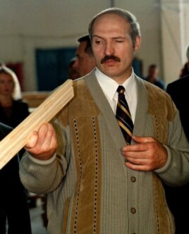 Early interest: President Alyaksandr Lukashenka during a 1999 visit to a wood plant in the town of Vileika.