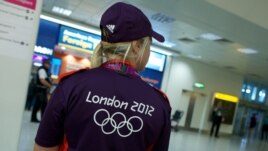 Volonteri na aerodromu Heathrow