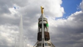 The Neutrality Arch capped with a gold statue of the late Saparmurat Niyazov in Ashgabat