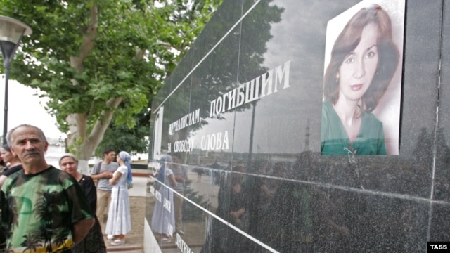 A portrait of slain rights activist Natalya Estemirova on a memorial in Grozny to journalists who have died in the fight for free speech