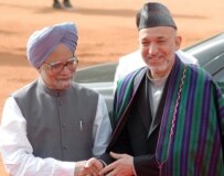 Prime Minister Singh (left) greeting Afghan President Hamid Karzai in New Dehli earlier this month (epa)