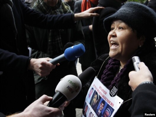 President Islam Karimov's iron grip on the country has forced many critics of his administration, including Mutabar Tajibaeva, seen here protesting in front of the European Commission in Brussels in January, to voice their grievances abroad or not at all.