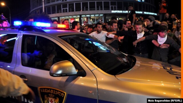 Students protest in Tbilisi over scenes of prison abuse aired by opposition-run television stations.