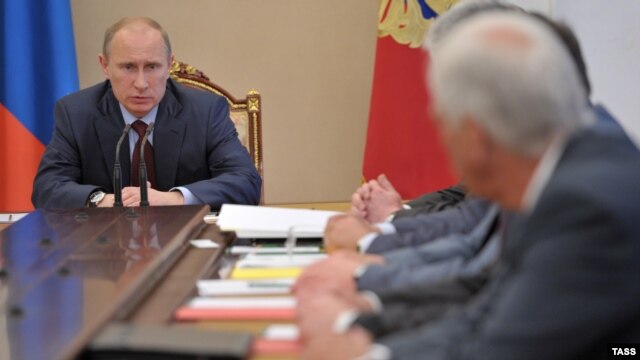 President Vladimir Putin chairs a meeting of Russia's Security Council in the Kremlin on July 6.