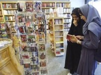 A slimmer choice: women browse a Tehran bookshop (file) (AFP)