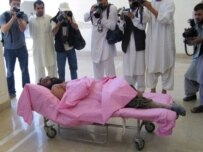 Mullah Dadullah's body was shown to journalists in Kandahar (AFP)