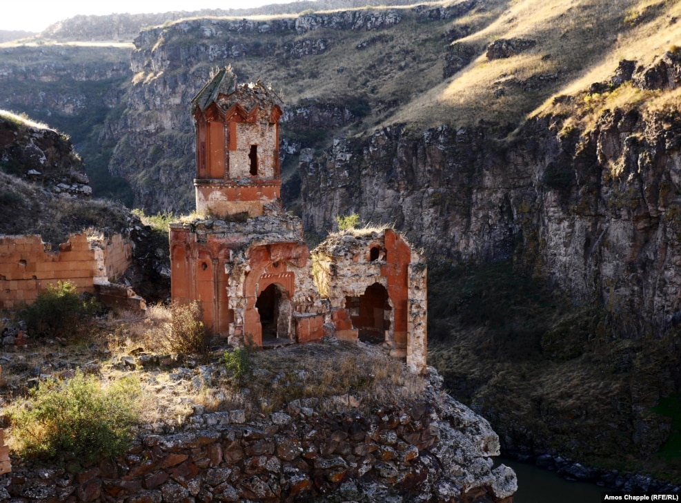 In a gorge that separates Armenia (background) from Turkey, the Monastery of the Hripsimian Virgins is one of the crumbling remnants of Ani, a capital once known as the &quot;City Of 1,001 Churches.&quot;