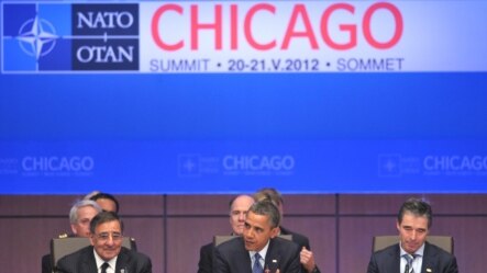 U.S. President Barack Obama (center) speaks during the Heads of Sate and Government North Atlantic Council meeting during the NATO summit in Chicago on May 20.