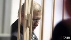 Former Russian lawmaker Mikhail Glushchenko was charged with complicity in the 1998 murder of State Duma deputy Galina Starovoitova.