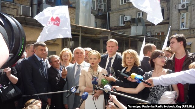 Yulia Tymoshenko addresses the media before her court hearing in Kyiv on May 11.