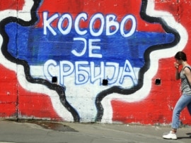 A map of Kosovo painted on a wall with the words 'Kosovo is Serbia' in Belgrade.